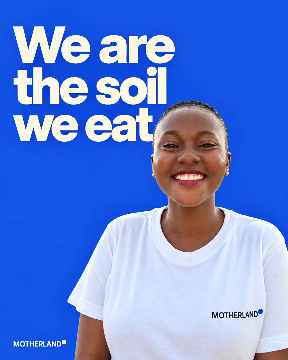 Campaign image: young woman from Siaya in a MOTHERLAND shirt, laughing